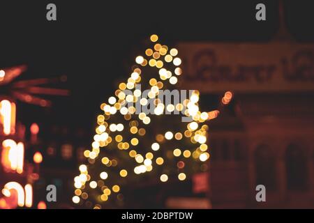 Blurry christmas market lights background, taken at Weimar christmas market, Thuringia, eastern Germany. Stock Photo