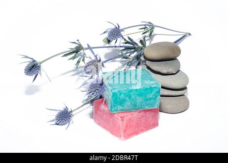 soaps off various shades with grey sone pebbles and lavender Stock Photo