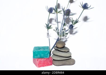 soaps off various shades with grey sone pebbles and lavender Stock Photo