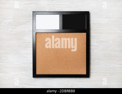 Photo frame on light wood table background. Responsive design template. Flat lay. Stock Photo