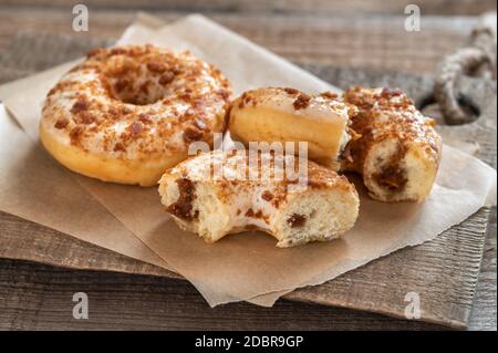 Two donuts on the wooden board Stock Photo