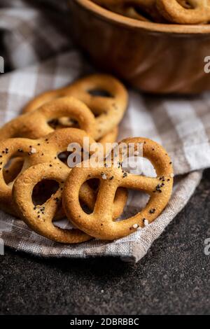 Crispy salted pretzels on checkered napkin. Stock Photo