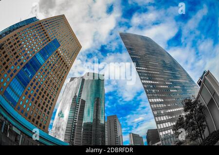 Minato-ku, Tokyo Shiodome office buildings and blue sky. Shooting Location: Tokyo metropolitan area Stock Photo