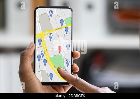 palm worship penny GPS Location Map Search On Mobile Phone Stock Photo - Alamy