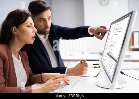 Programmer And Software Developer Working On Computer In Office Stock Photo