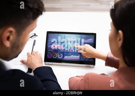 KPI Data Business Dashboard On Laptop Or Digital Tablet Stock Photo