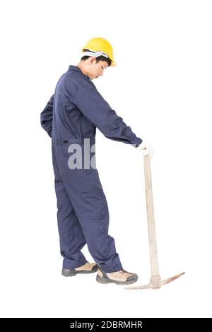 Young man in uniform hold old pick mattock that is a mining device, Cut out isolated on white background Stock Photo