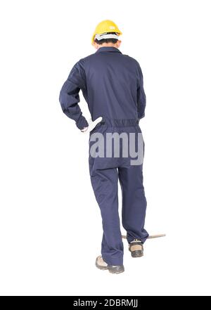 Young man in uniform hold old pick mattock that is a mining device, Cut out isolated on white background Stock Photo