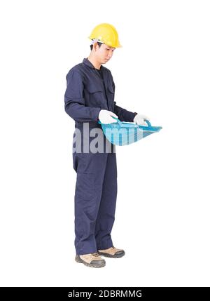 Young worker in uniform hold Hod or clam-shell shaped basket is a construction tools  ,Cut out isolated on white background Stock Photo