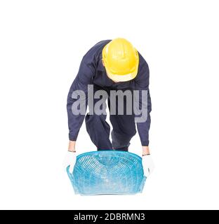 Young worker in uniform hold Hod or clam-shell shaped basket is a construction tools  ,Cut out isolated on white background Stock Photo