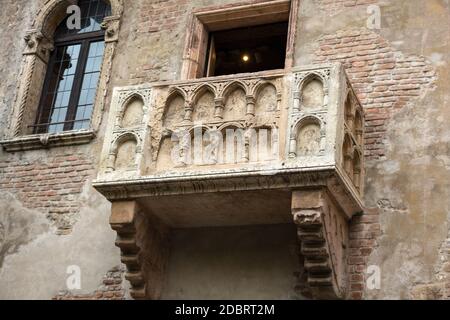 Juliet balcony in Verona. Romeo and Juliet is a tragedy written by William Shakespeare. This place is the main tourist attraction in Verona. Stock Photo