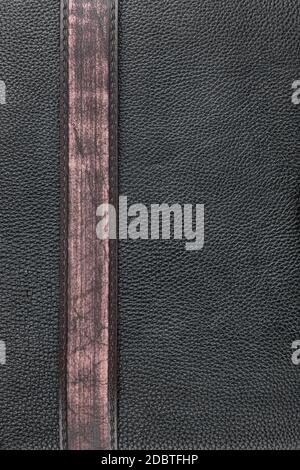 Brown belt lies on the natural leather, can be used as a background, texture, menu Stock Photo