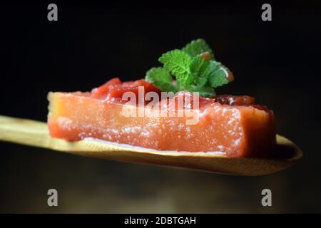 Slice of aspic with peaches Stock Photo