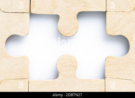Close up shot of Missing jigsaw puzzle pieces on white background,business concept Stock Photo