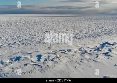 The shore of the arctic ocean. Snow and ice on the shore. Stock Photo
