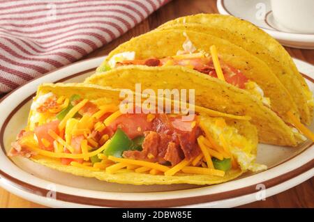 Breakfast tacos iwth bacon, scrambled eggs and green peppers