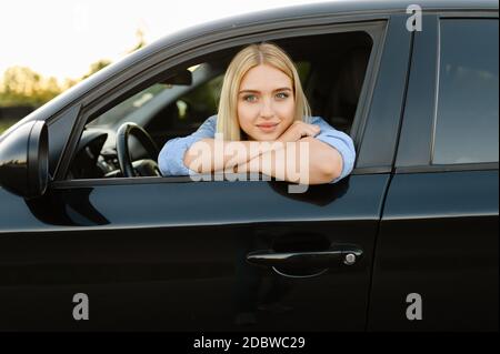 Successful arab man wear in striped shirt and sunglasses pose behind the  wheel of his white suv car. Stylish arabian men in transport. 10556585  Stock Photo at Vecteezy