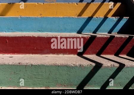 pastel colored concrete stairs with shadows Stock Photo
