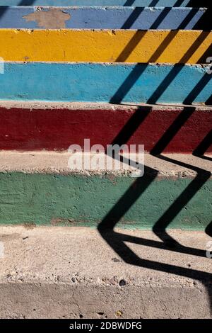 pastel colored concrete stairs with shadows Stock Photo