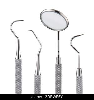A set of dental tools. Mirror scaler and sickle probe dental explorer on white Stock Photo