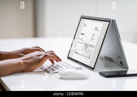 Digital Invoice Document Or Payment Receipt On Laptop Stock Photo