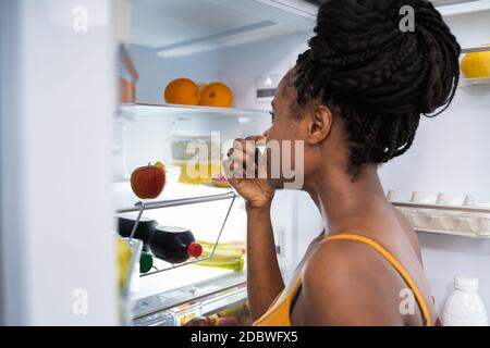 Rotten Fruit Bad Smell In Open Fridge Or Refrigerator Stock Photo