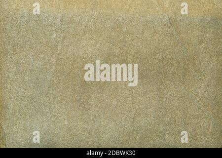A brown beige cloth-like paper surface, macro shot Stock Photo