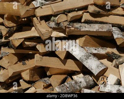 chopped birch firewood, heap, background Stock Photo