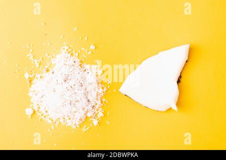 Happy coconuts day concept, fresh coconut group set different half and slices, studio shot isolated on yellow background Stock Photo