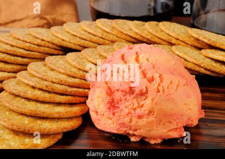 Cheddar cheese and port wine cheese ball with crackers Stock Photo