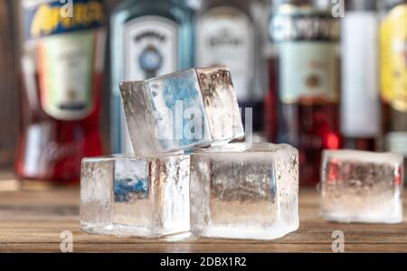 Crystal clear ice cubes on the bar counter Stock Photo