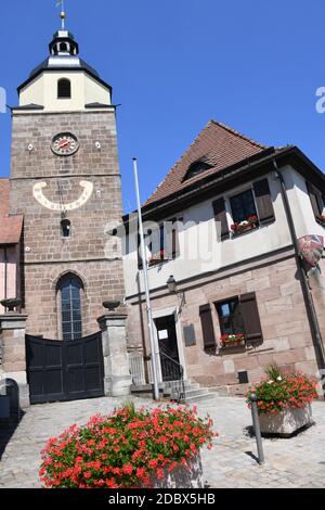 The town hall,BÃ¼rgeramt-Nord in the district of Nuremberg GroÃŸgrÃ¼ndlach with the ev.-luth church Of St. Laurentius Stock Photo