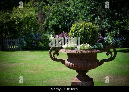 Pleasure garden with lawn, pot of plants and flower beds. High quality photo Stock Photo