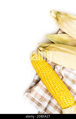 Uncooked corn cob isolated on white background. Stock Photo