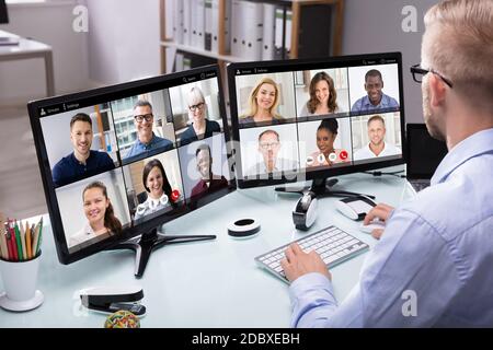 Video Conferencing Call Business Meeting On Computer Stock Photo