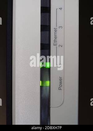 Ethernet and power green led on a modem router Stock Photo - Alamy