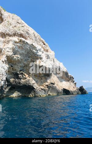 Blue Cave carved in the limestone by the Adriatic Sea, view from the water, Bisevo Island, Croatia Stock Photo