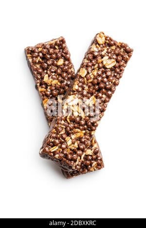 Chocolate cereal bars. Tasty protein bars isolated on white background. Stock Photo