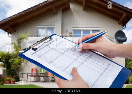 Real Estate Home Property Inspecting And Appraisal By Appraiser Stock Photo
