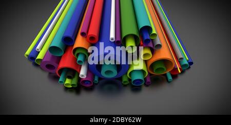 Colorful Plastic pipes on dark background Stock Photo