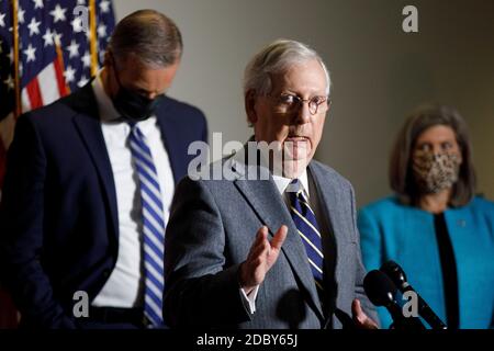 Washington, USA. 18th Nov, 2020. U.S. Senate Majority Leader Mitch McConnell (C) speaks during a press conference on Capitol Hill in Washington, DC, the United States, Nov. 17, 2020. U.S. Democratic leaders on Tuesday asked Senate Majority Leader Mitch McConnell to restart negotiations on a new COVID-19 relief package this week as confirmed cases are surging across the country. Credit: Ting Shen/Xinhua/Alamy Live News Stock Photo