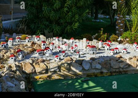 Model village made from red and white painted stones, La Mata, Torrevieja, Costa Blanca, Alicante, Spain Stock Photo