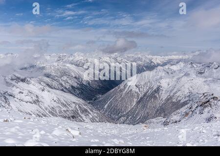 Aerial view of snow covered mountain range Stock Photo