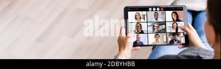 Online Video Conference Webcam Interview On Tablet Stock Photo