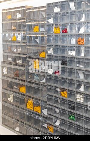 Platic Shelf Rack for Small Parts at Wall Storage Stock Photo - Alamy
