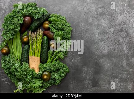 Green vegetables and leafy food background. Healthy eating green concept of fresh organic products. Top view, copy space. Stock Photo