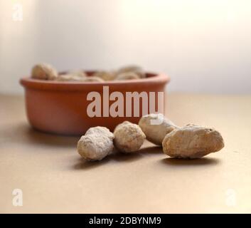 Shelled peanuts salted in clay pot Stock Photo