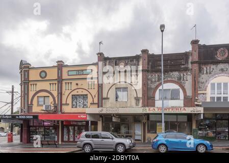 A line of slightly dilapidated, connected Federation design doubled storey shop fronts in Haberfield, New South Wales, Australia Stock Photo