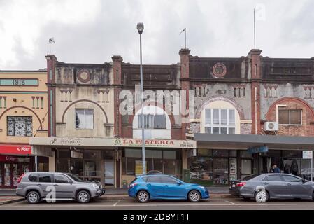 A line of slightly dilapidated, connected Federation design doubled storey shop fronts in Haberfield, New South Wales, Australia Stock Photo