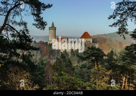 View of old stone Kokorin Castle built in 14th century.It lies in the middle of a nature reserve on a steep rocky spur above the Kokorin Valley. Stock Photo